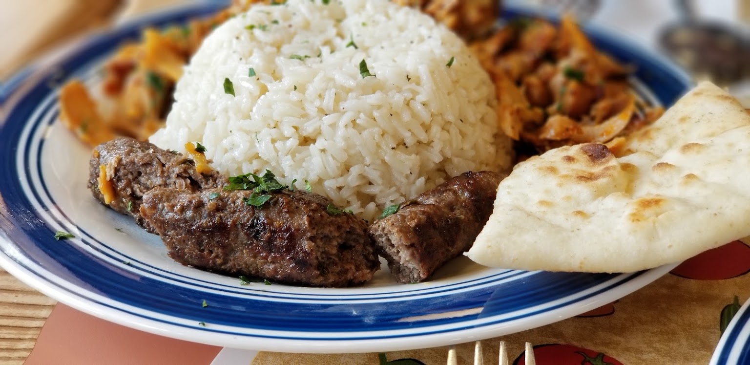 Combo platter served with beef kofta, chicken shwarma and rice